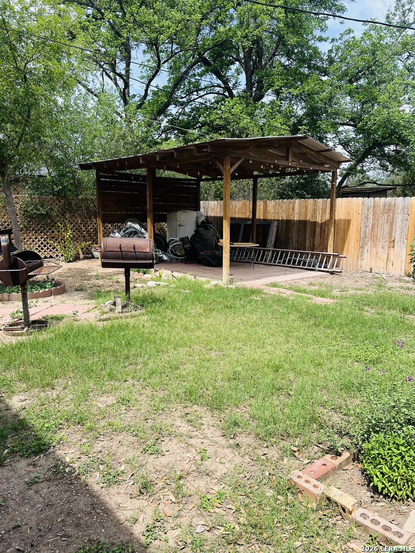 552 Diaz Street Uvalde, TX 78801 - Photo 2 of 14 a view of a backyard with sitting area and furniture