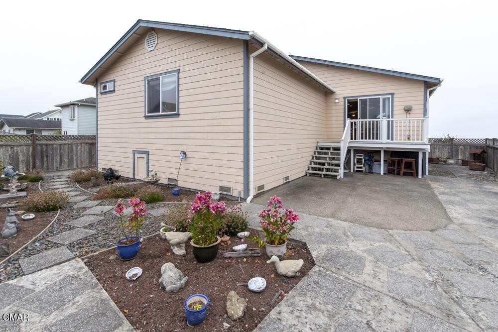 970 Glass Beach Drive Fort Bragg, CA 95437 - Photo 20 of 26 a view of a house with a patio