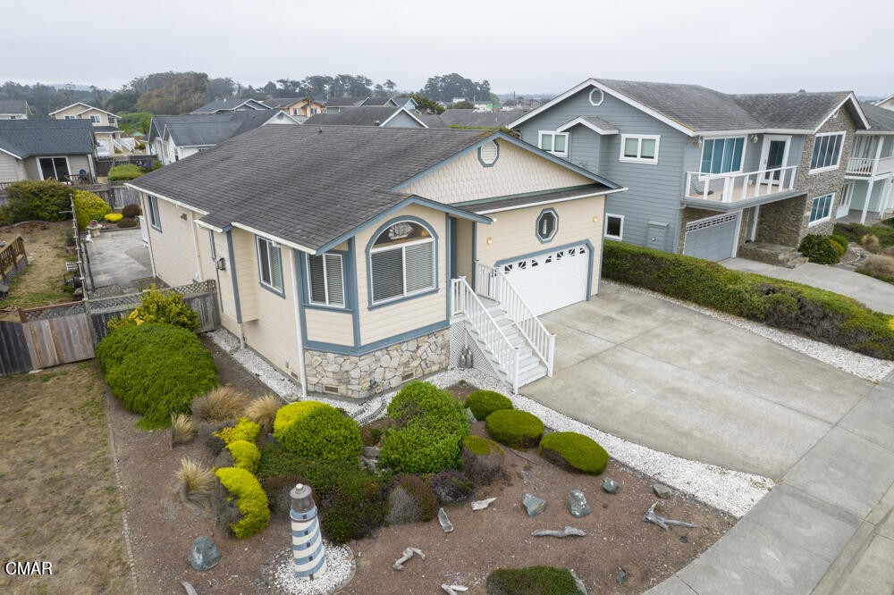 970 Glass Beach Drive Fort Bragg, CA 95437 - Photo 4 of 26 an aerial view of a house with a yard