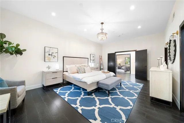 a bathroom with a shower a toilet and sink