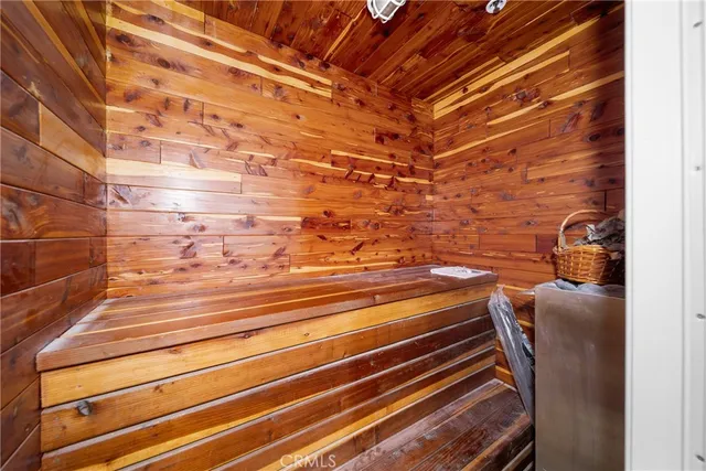 a view of a patio with wooden floor and city view