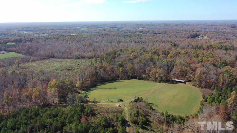 0 Fire Tower Road Snow Camp, NC 27349 - Photo 16 of 18 an aerial view of a house with a yard