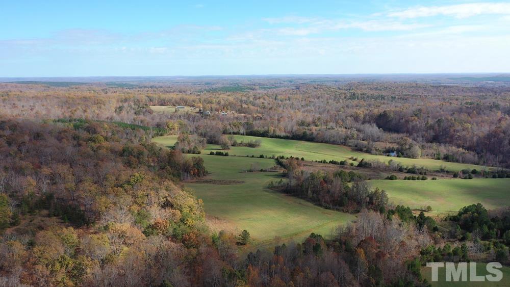0 Fire Tower Road Snow Camp, NC 27349 - Photo 17 of 18 an aerial view of residential houses with outdoor space and trees