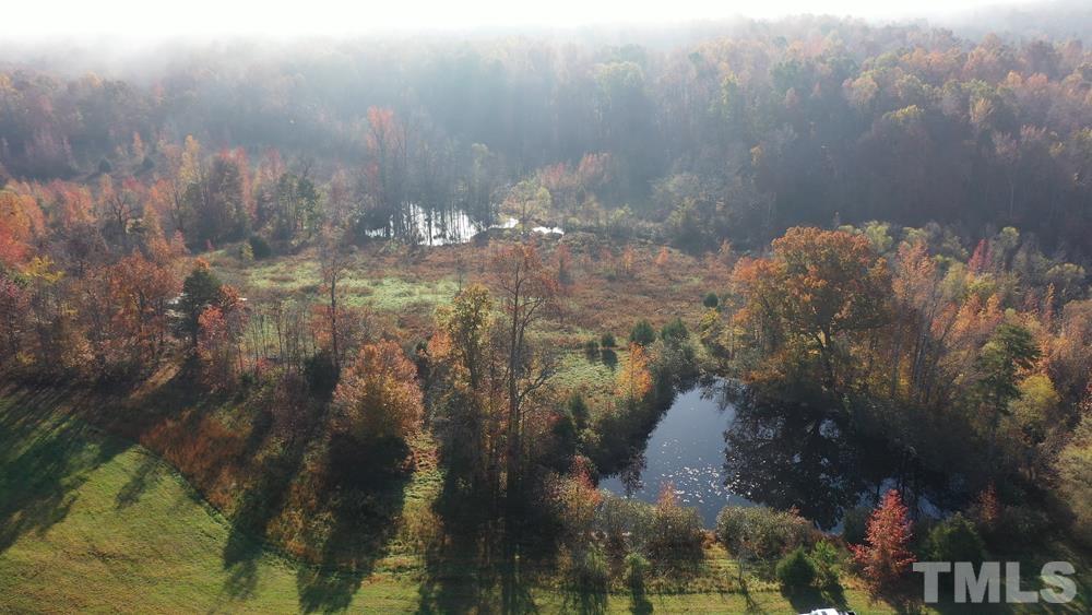 0 Fire Tower Road Snow Camp, NC 27349 - Photo 5 of 18 a close up of a house in a forest