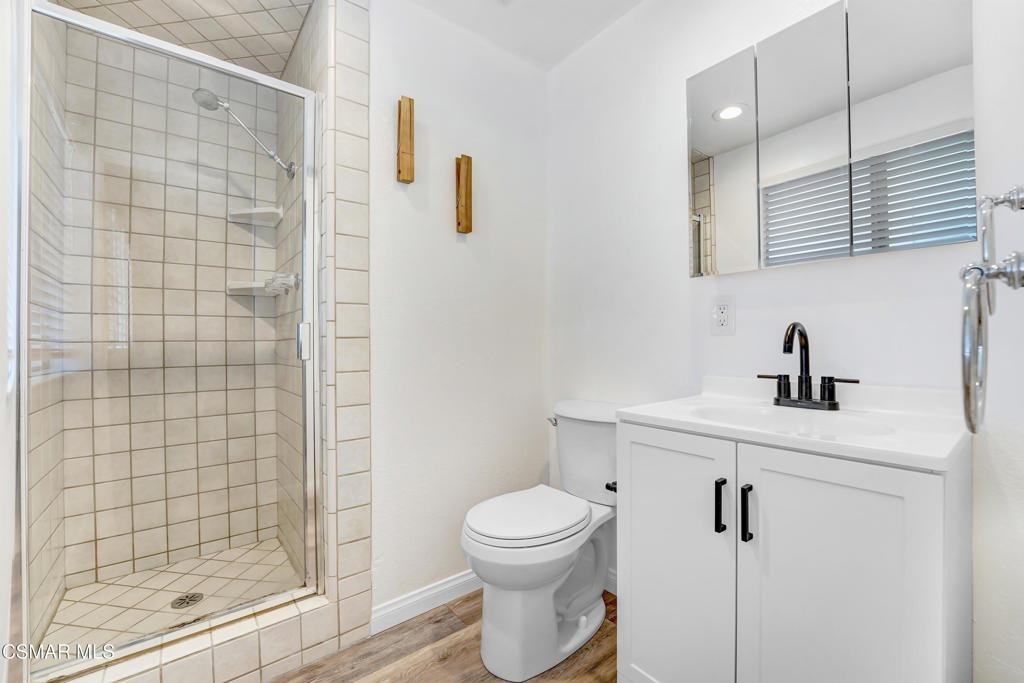 2872 Galena Avenue Simi Valley, CA 93065 - Photo 17 of 20 a bathroom with a toilet sink and shower