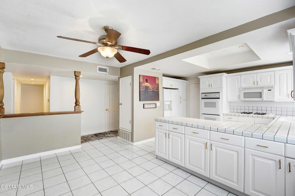 2872 Galena Avenue Simi Valley, CA 93065 - Photo 2 of 20 a spacious bathroom with a sink a mirror and a shower