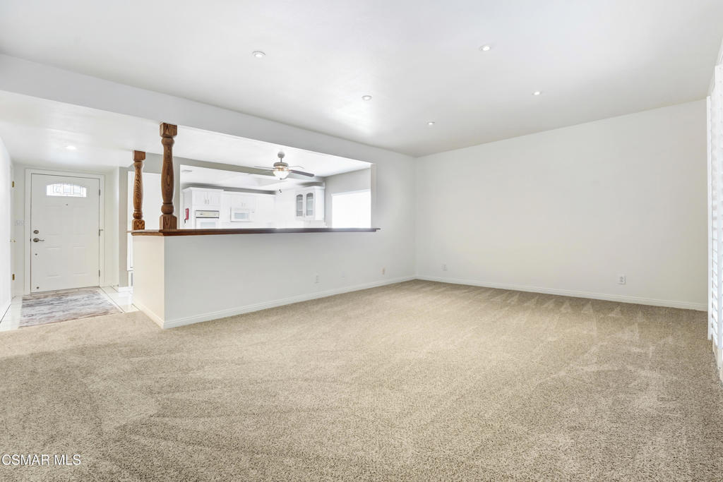 2872 Galena Avenue Simi Valley, CA 93065 - Photo 8 of 20 an empty room with a kitchen view and a window