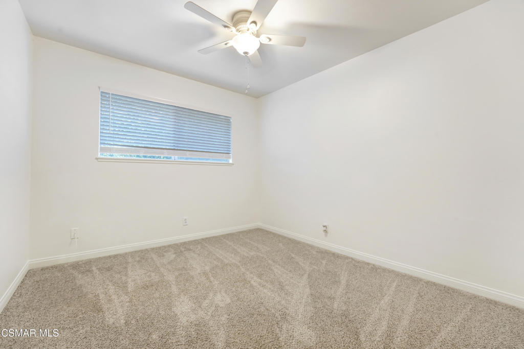 2872 Galena Avenue Simi Valley, CA 93065 - Photo 10 of 20 an empty room with a window and ceiling fan