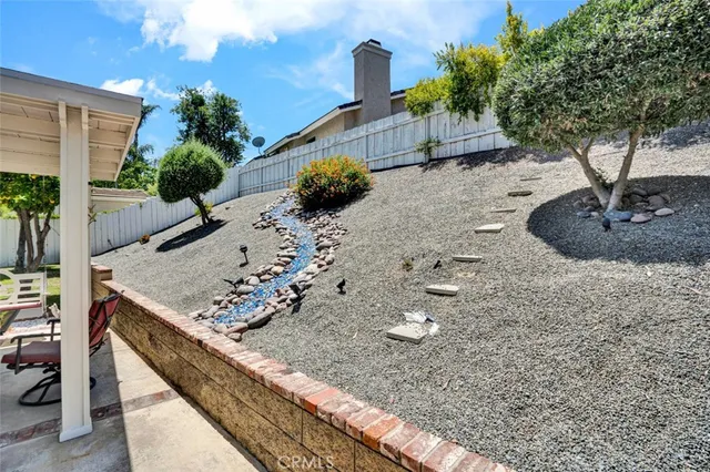 a view of a backyard with plants