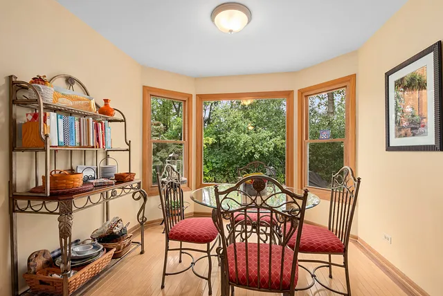 a view of a dining room with furniture window and outside view