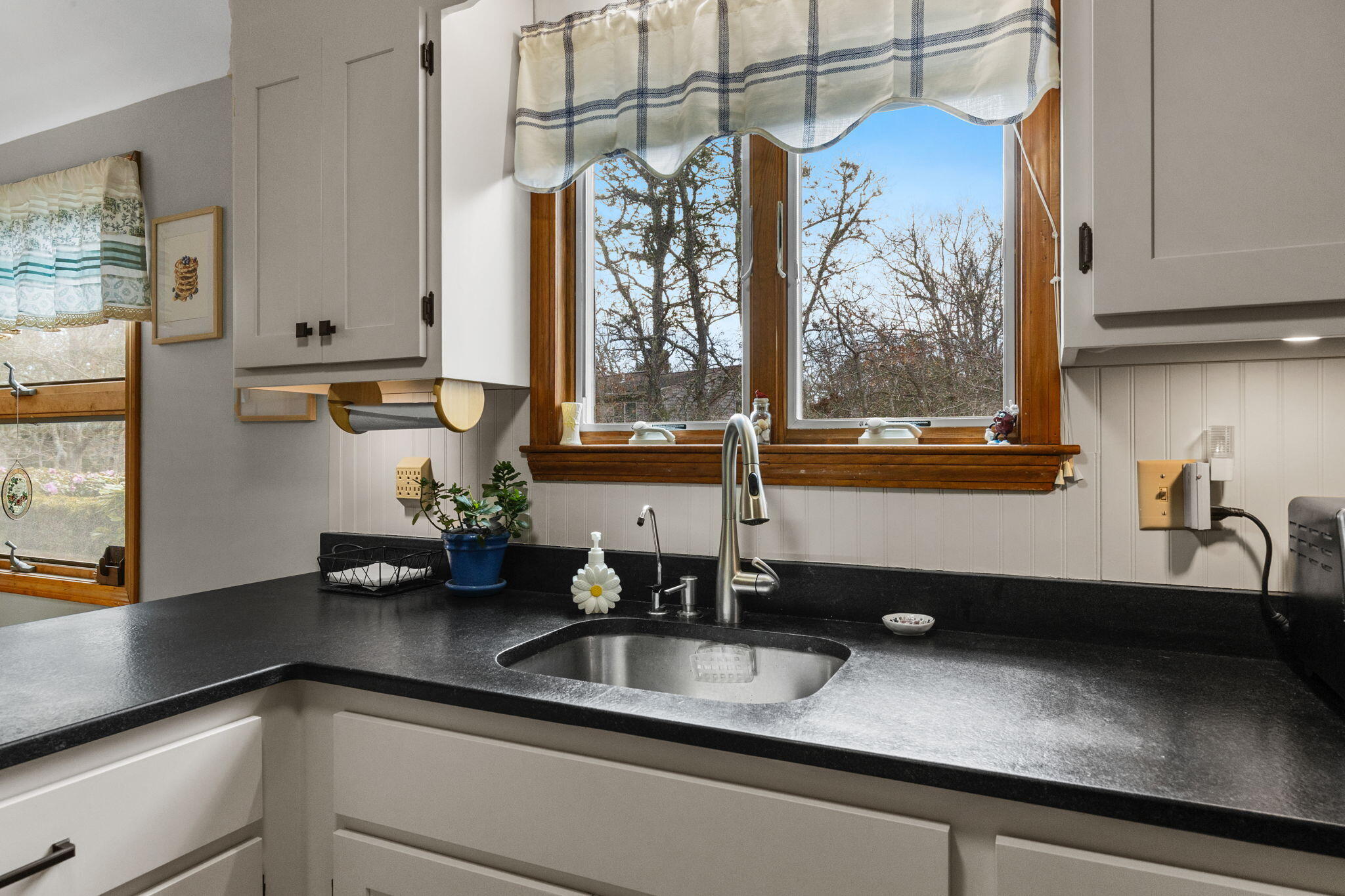 252 Chatham Road Harwich, MA 02645 - Photo 12 of 38 a kitchen with a sink and a window