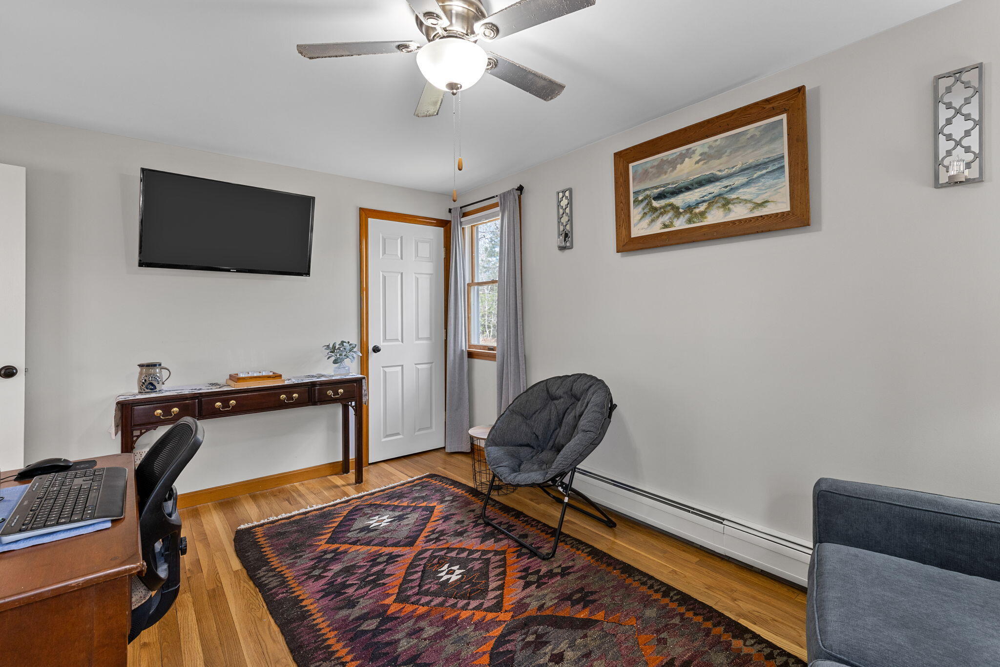 252 Chatham Road Harwich, MA 02645 - Photo 20 of 38 a living room with furniture and a flat screen tv