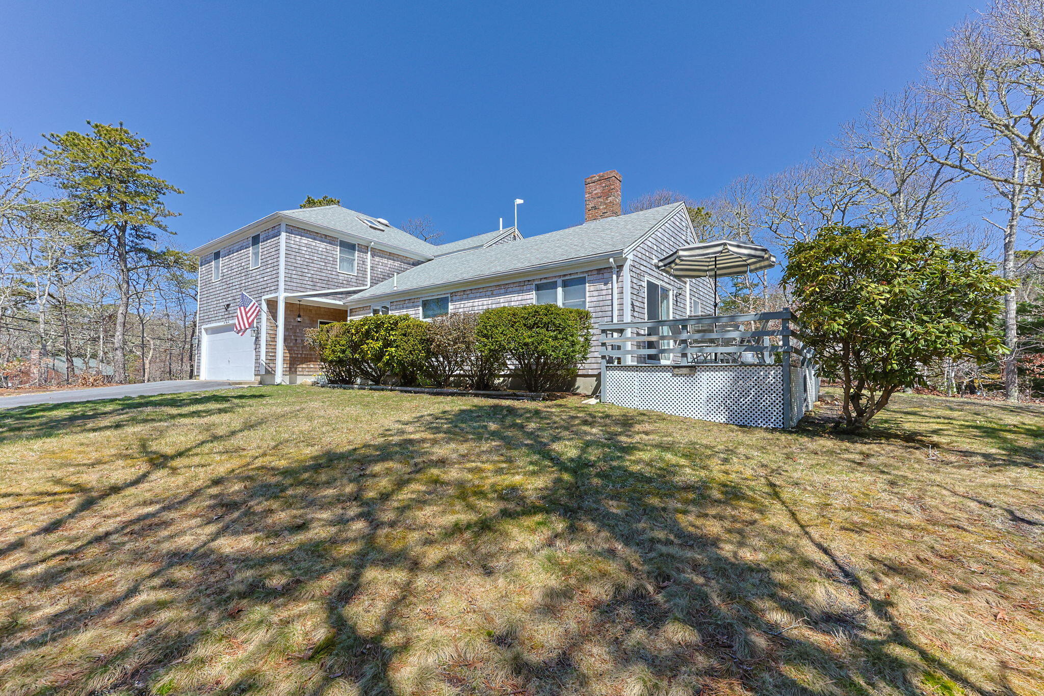 252 Chatham Road Harwich, MA 02645 - Photo 2 of 38 a front view of a house with a yard