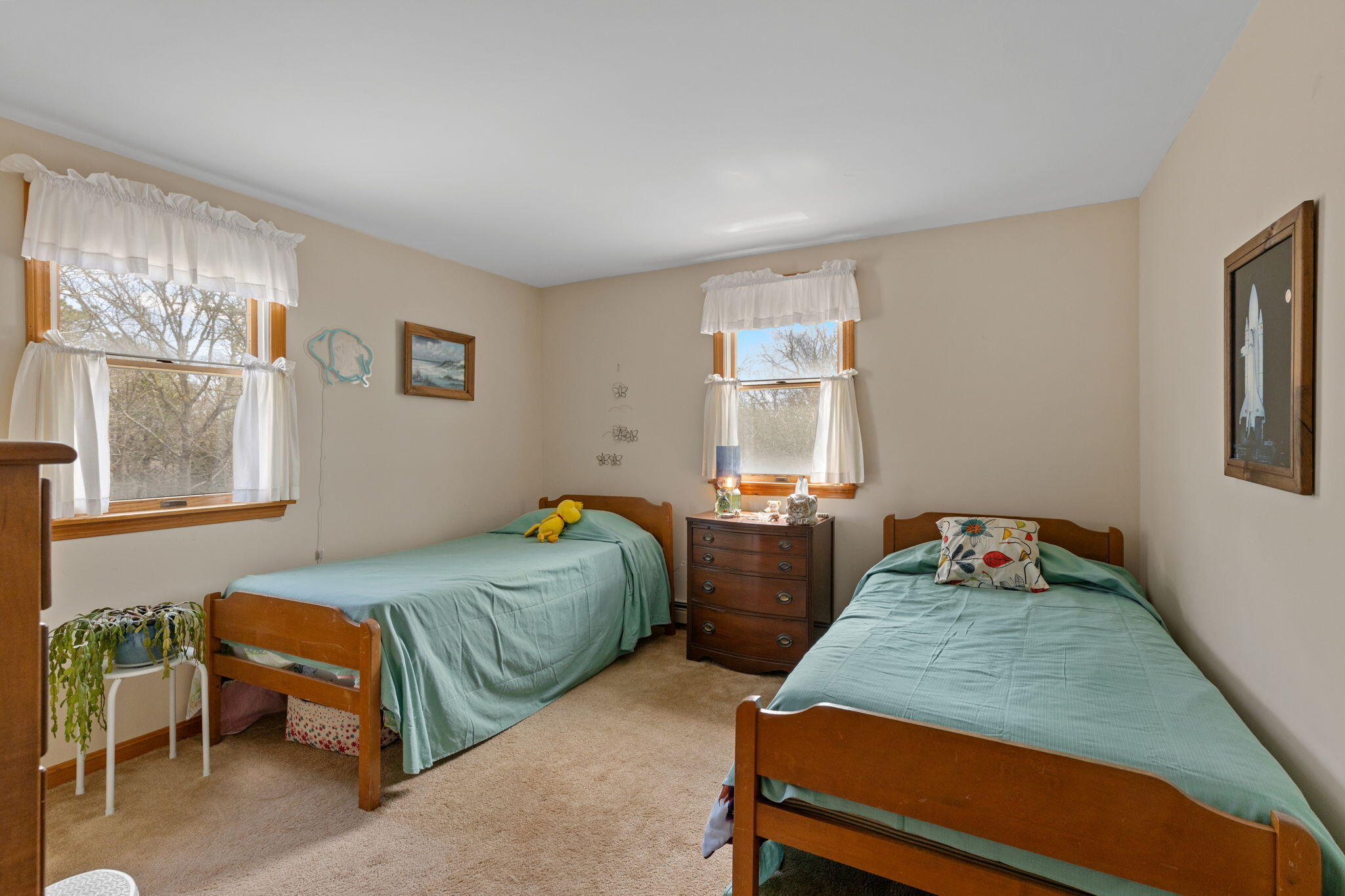 252 Chatham Road Harwich, MA 02645 - Photo 28 of 38 a bedroom with two beds and a window