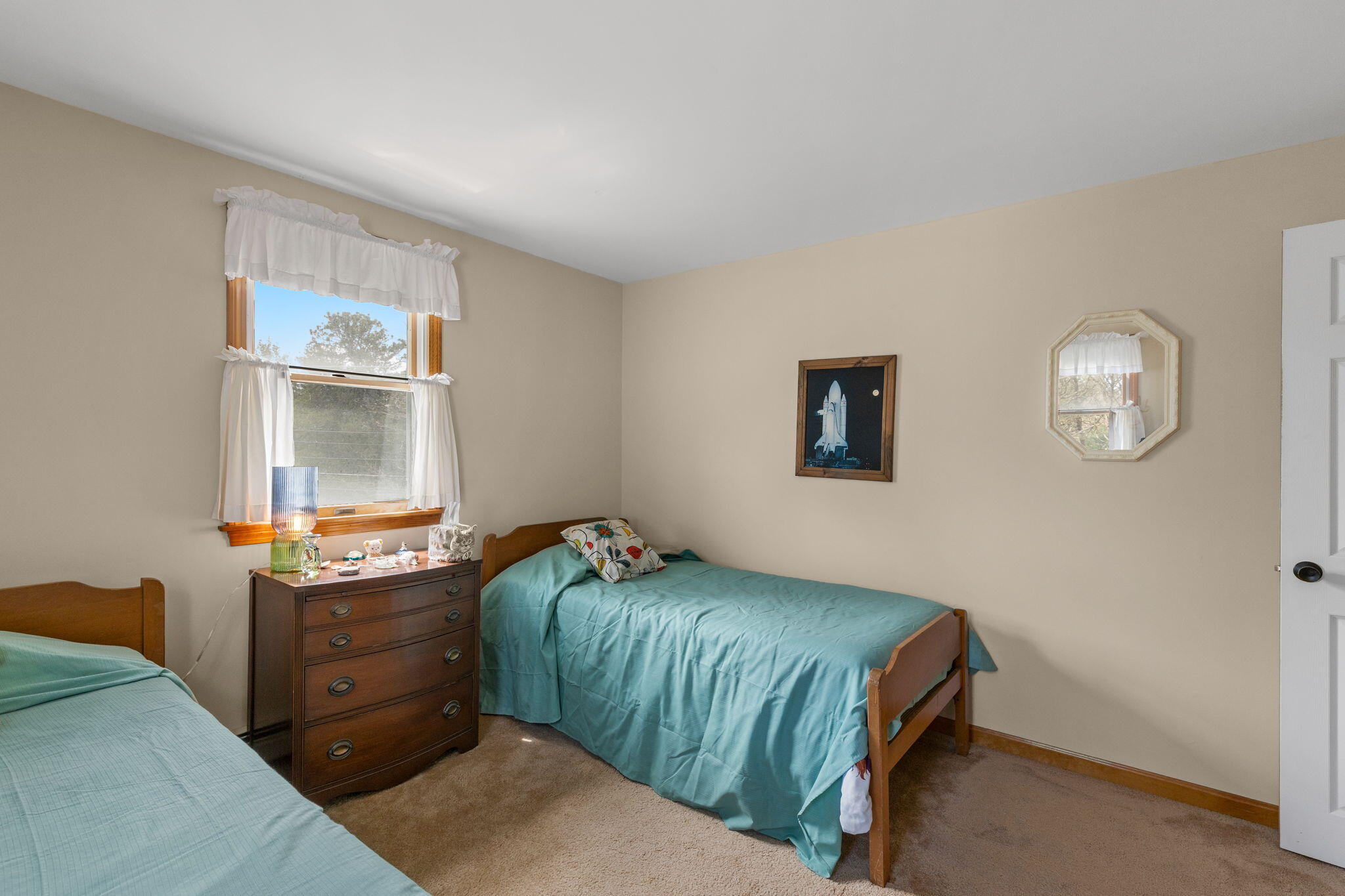 252 Chatham Road Harwich, MA 02645 - Photo 29 of 38 a bedroom with a bed and a window