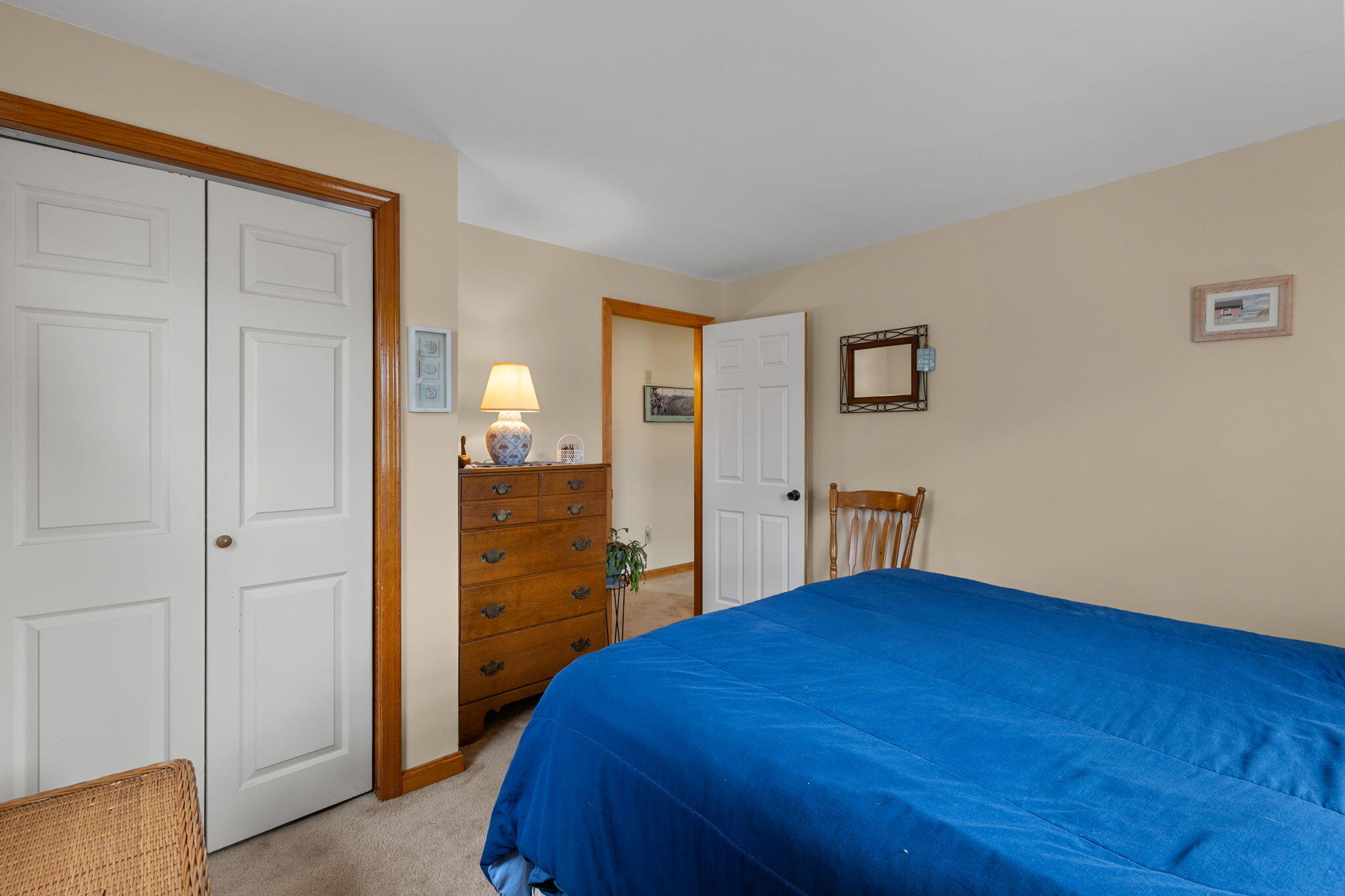 252 Chatham Road Harwich, MA 02645 - Photo 31 of 38 a bedroom with a bed and cabinets