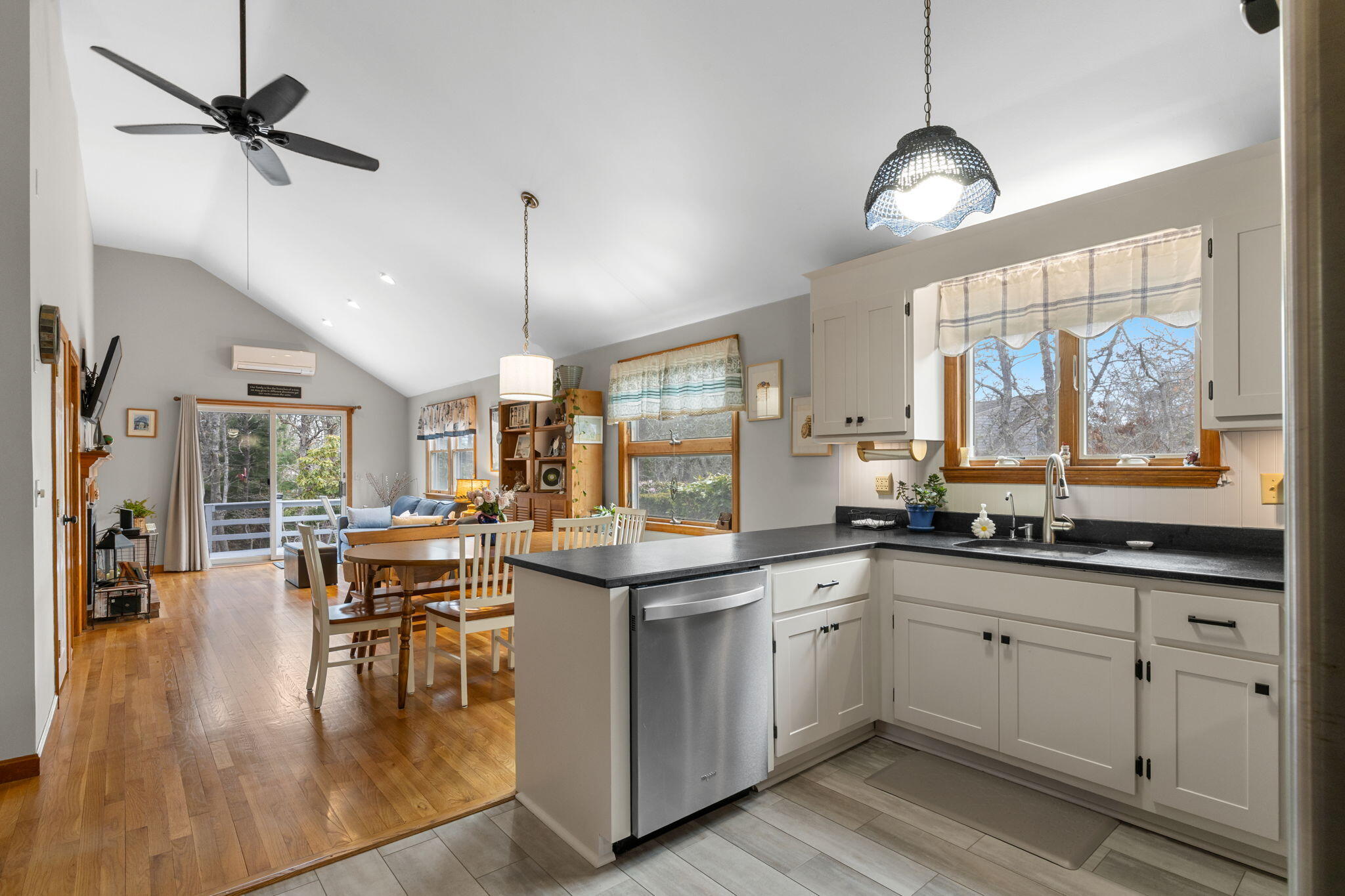 252 Chatham Road Harwich, MA 02645 - Photo 10 of 38 a kitchen with lots of counter top space and dining table