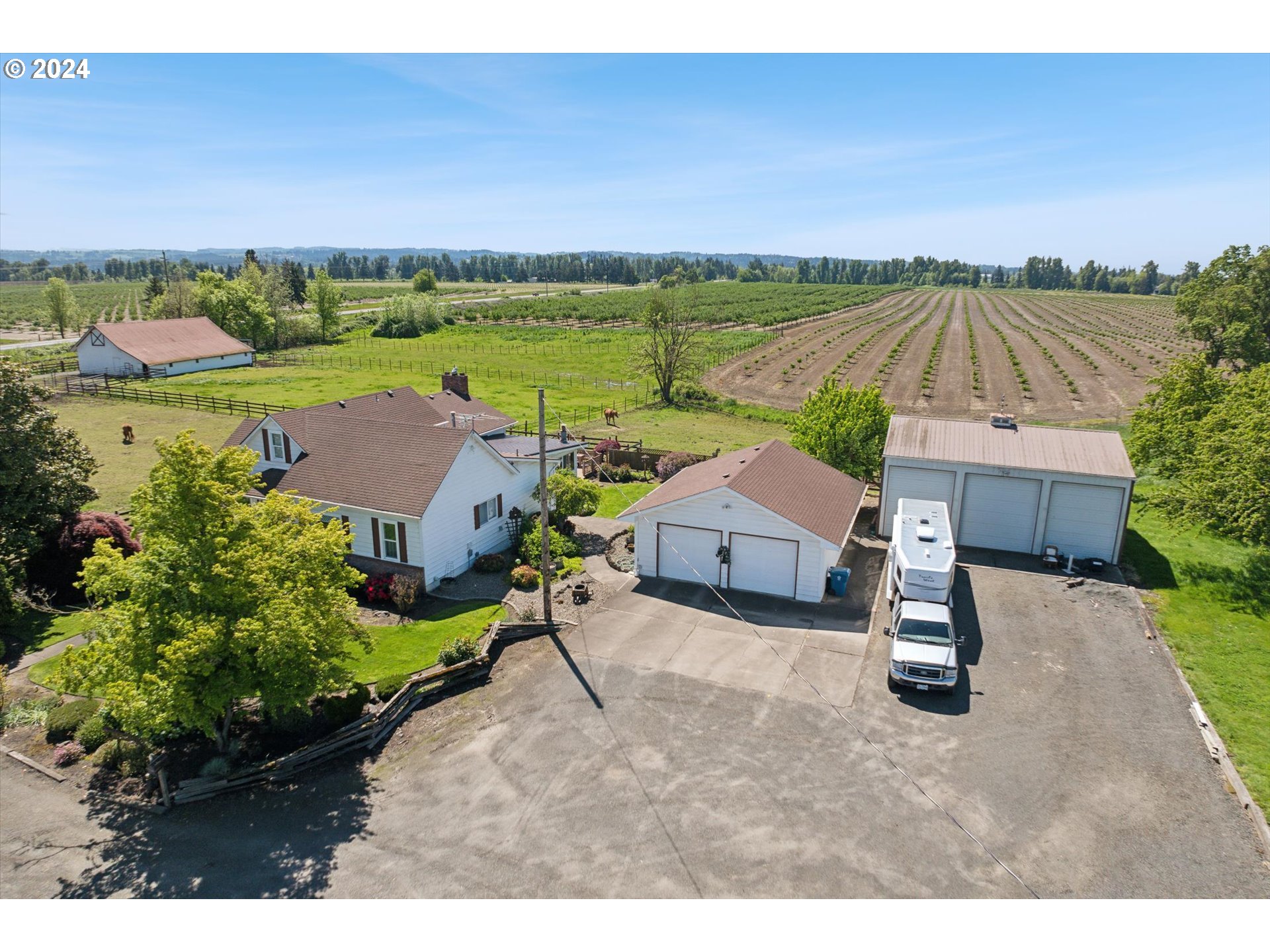 12996 Downs Road Northeast Mount Angel, OR 97362 - Photo 9 of 35 a aerial view of a house with outdoor space and a swimming pool