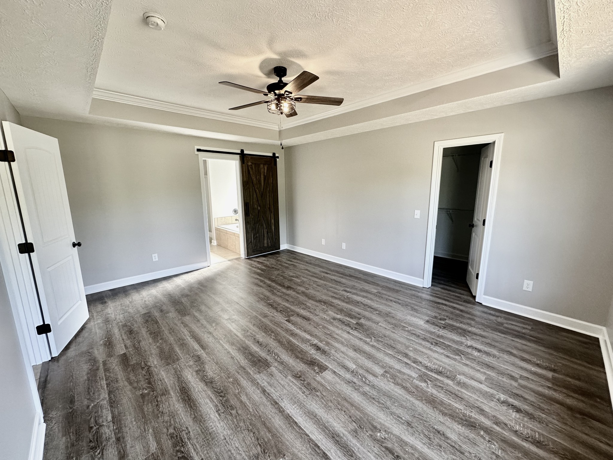 216 Clubbs Road Portland, TN 37148 - Photo 6 of 14 wooden floor in an empty room with a window