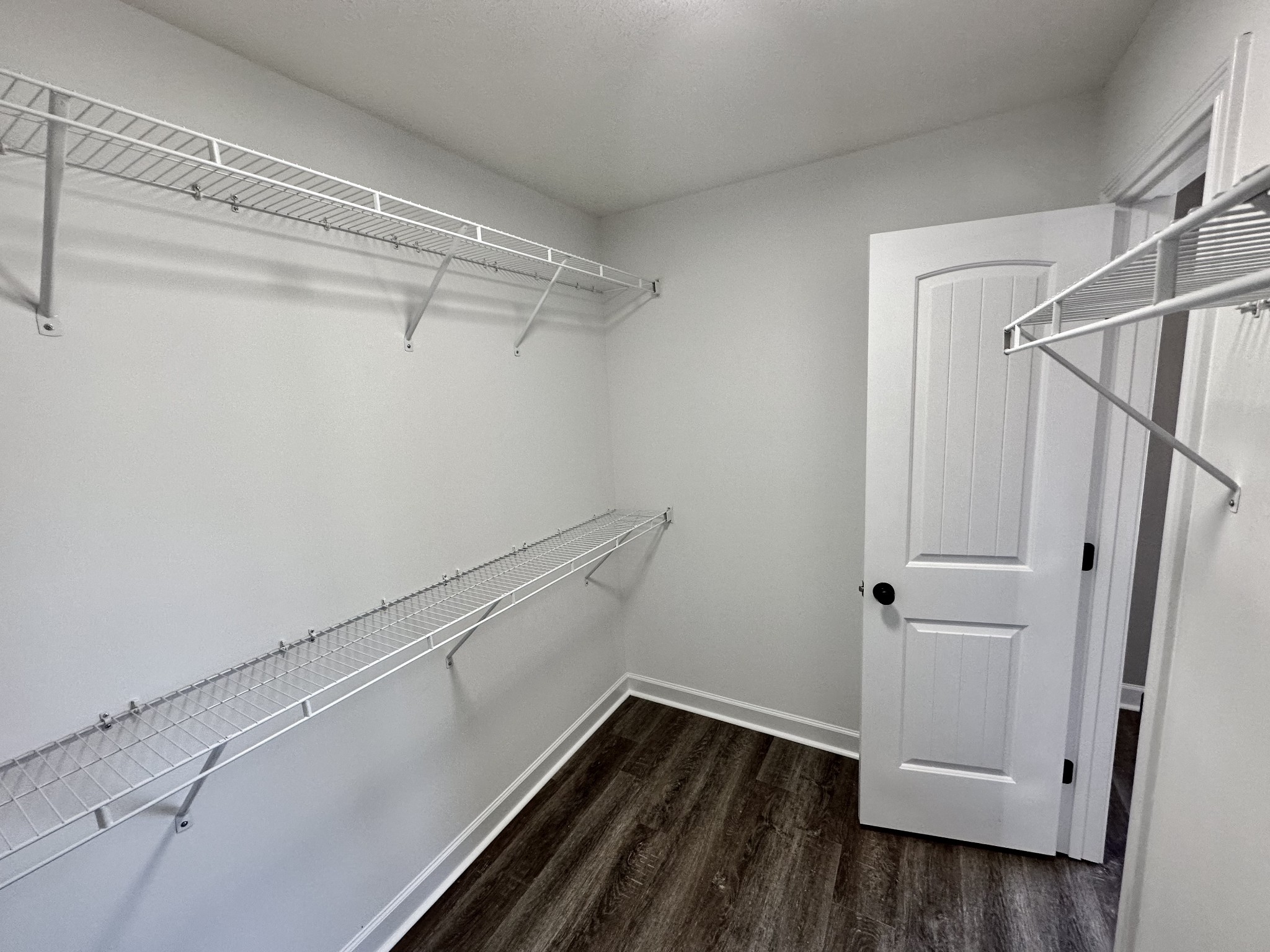 216 Clubbs Road Portland, TN 37148 - Photo 7 of 14 a view of an empty walk in closet