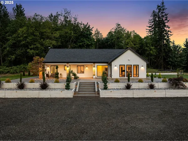 a view of house with outdoor space and seating area