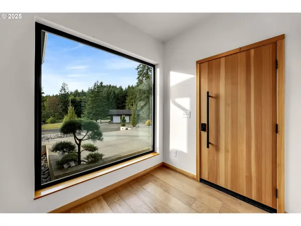 a view of a room with a large window