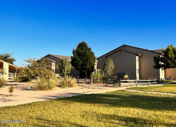 a view of swimming pool with outdoor seating