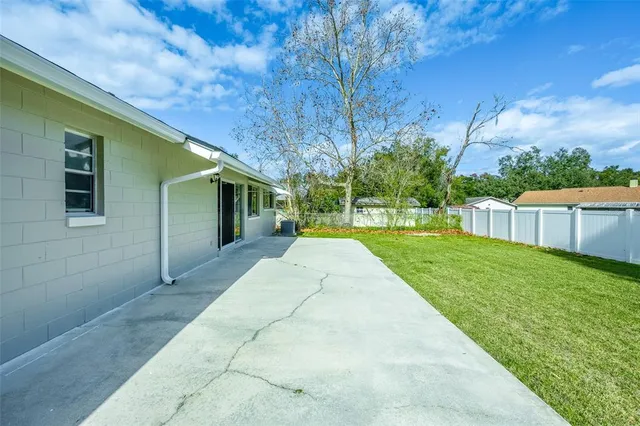 a view of backyard with green space