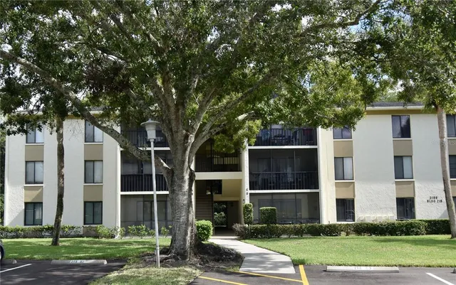 a house with garden in front of it
