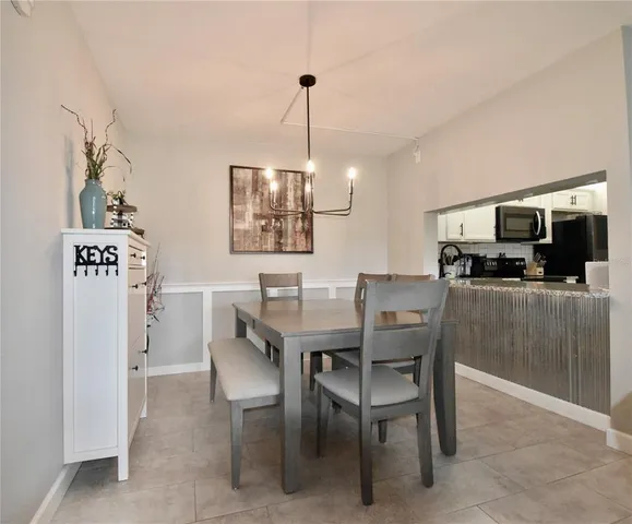 a view of a dining room with furniture
