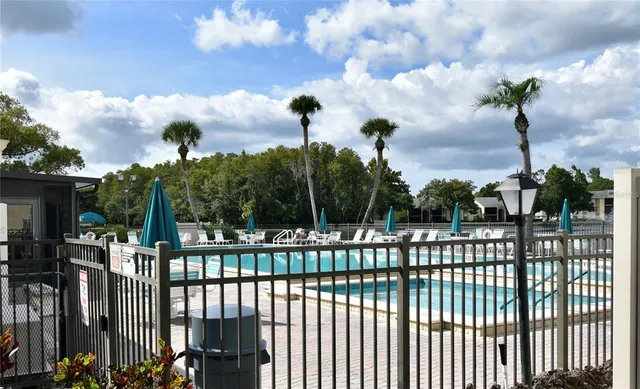 a view of a lake with a yard