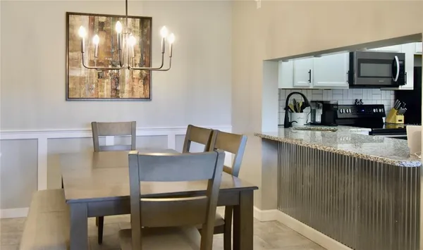 a view of kitchen with breakfast area