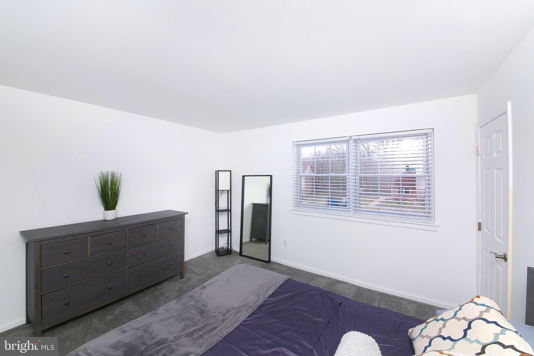 62 Shannon Road North Wales, PA 19454 - Photo 13 of 20 a room with furniture and a potted plant