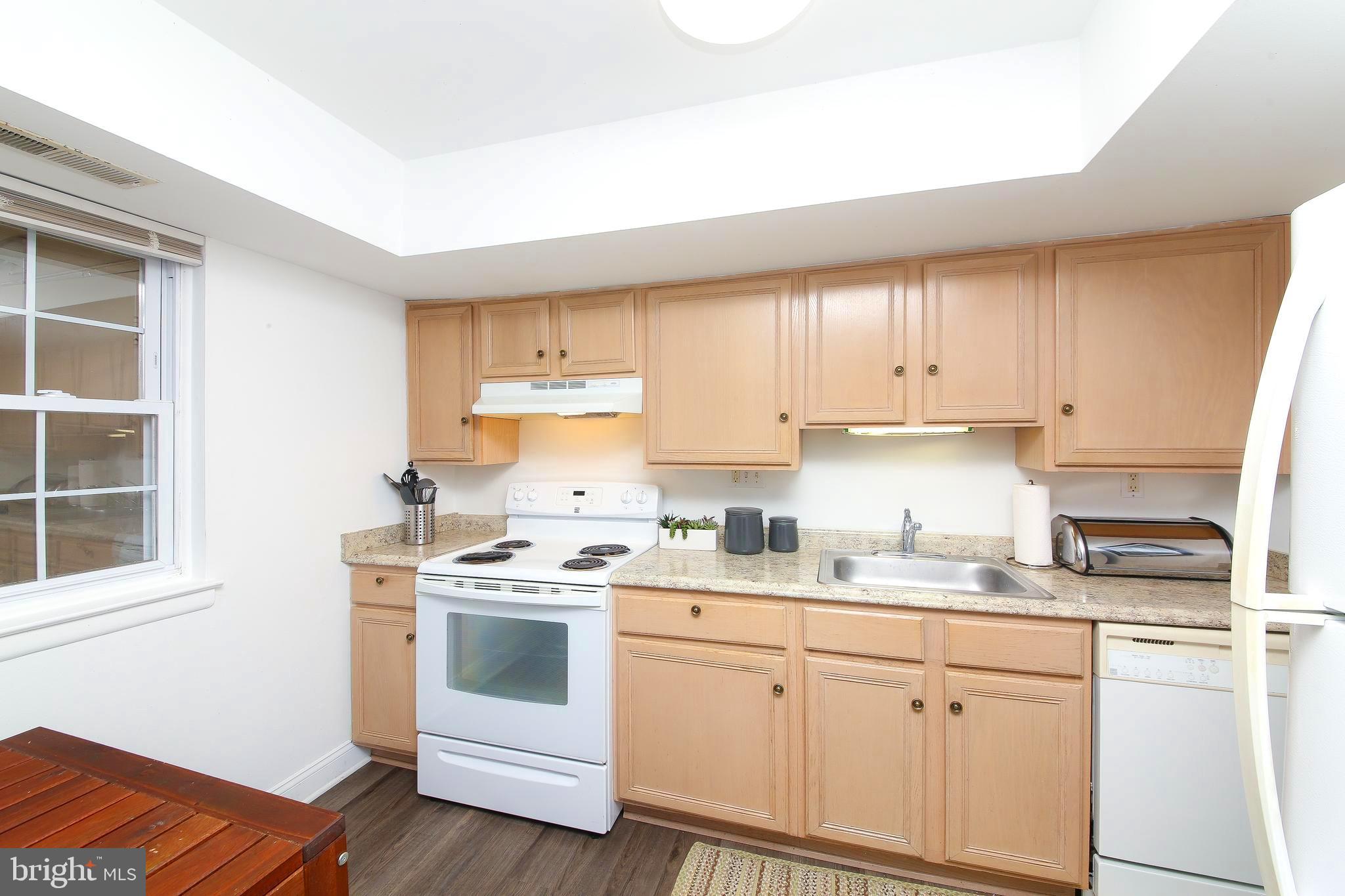 62 Shannon Road North Wales, PA 19454 - Photo 9 of 20 a kitchen with a white stove top oven and white cabinets
