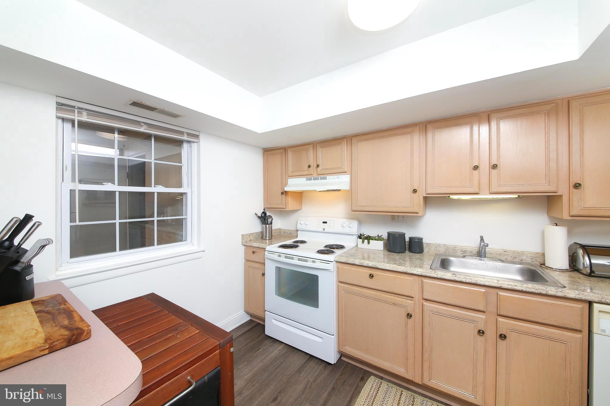 62 Shannon Road North Wales, PA 19454 - Photo 10 of 20 a kitchen with a stove a sink and white cabinets