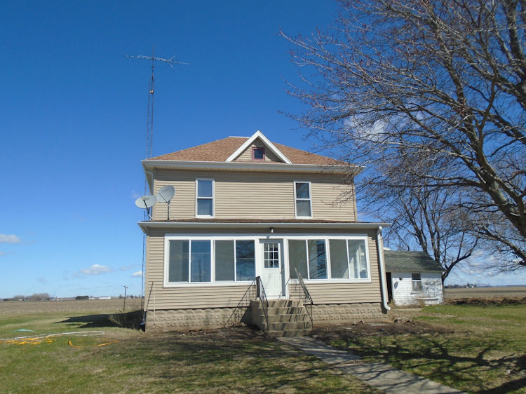 2324 Reynolds Road Ashton, IL 61006 - Photo 2 of 17 a front view of a house with a yard