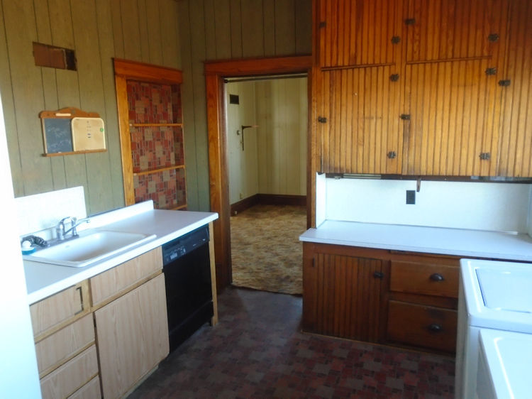 2324 Reynolds Road Ashton, IL 61006 - Photo 3 of 17 a kitchen with a sink and cabinets