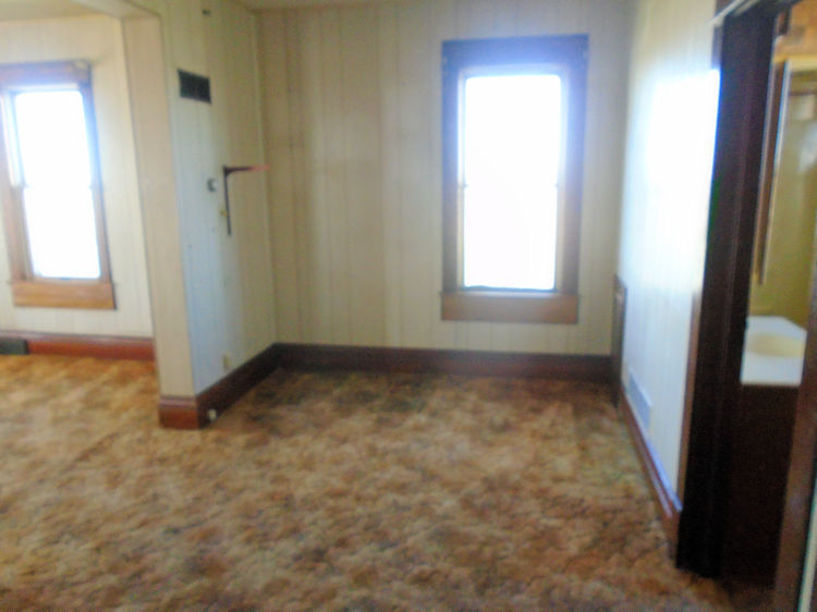 2324 Reynolds Road Ashton, IL 61006 - Photo 7 of 17 an empty room with a window