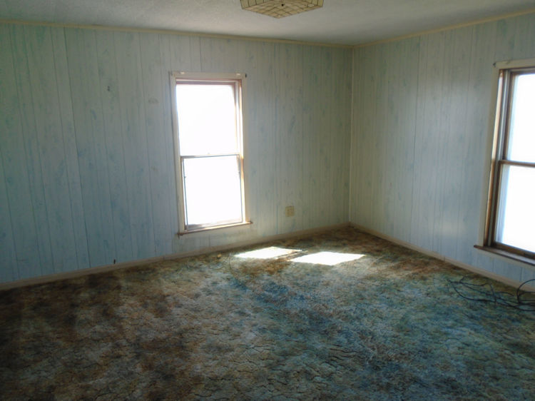 2324 Reynolds Road Ashton, IL 61006 - Photo 10 of 17 an empty room with a window
