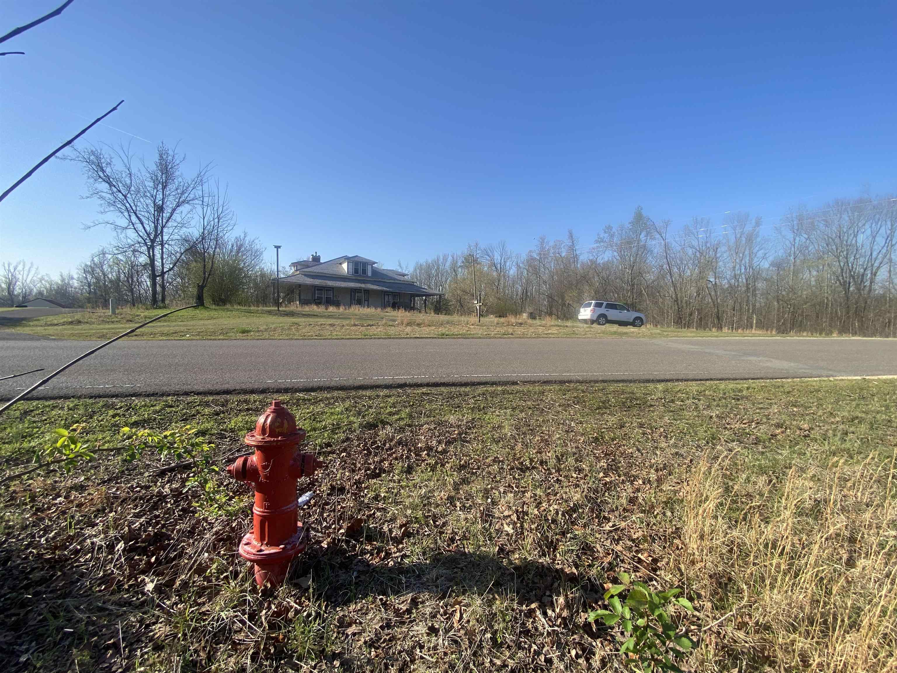 5405 Coffee Landing Road Morris Chapel, TN 38361 - Photo 20 of 32 a view of a lake with a yard