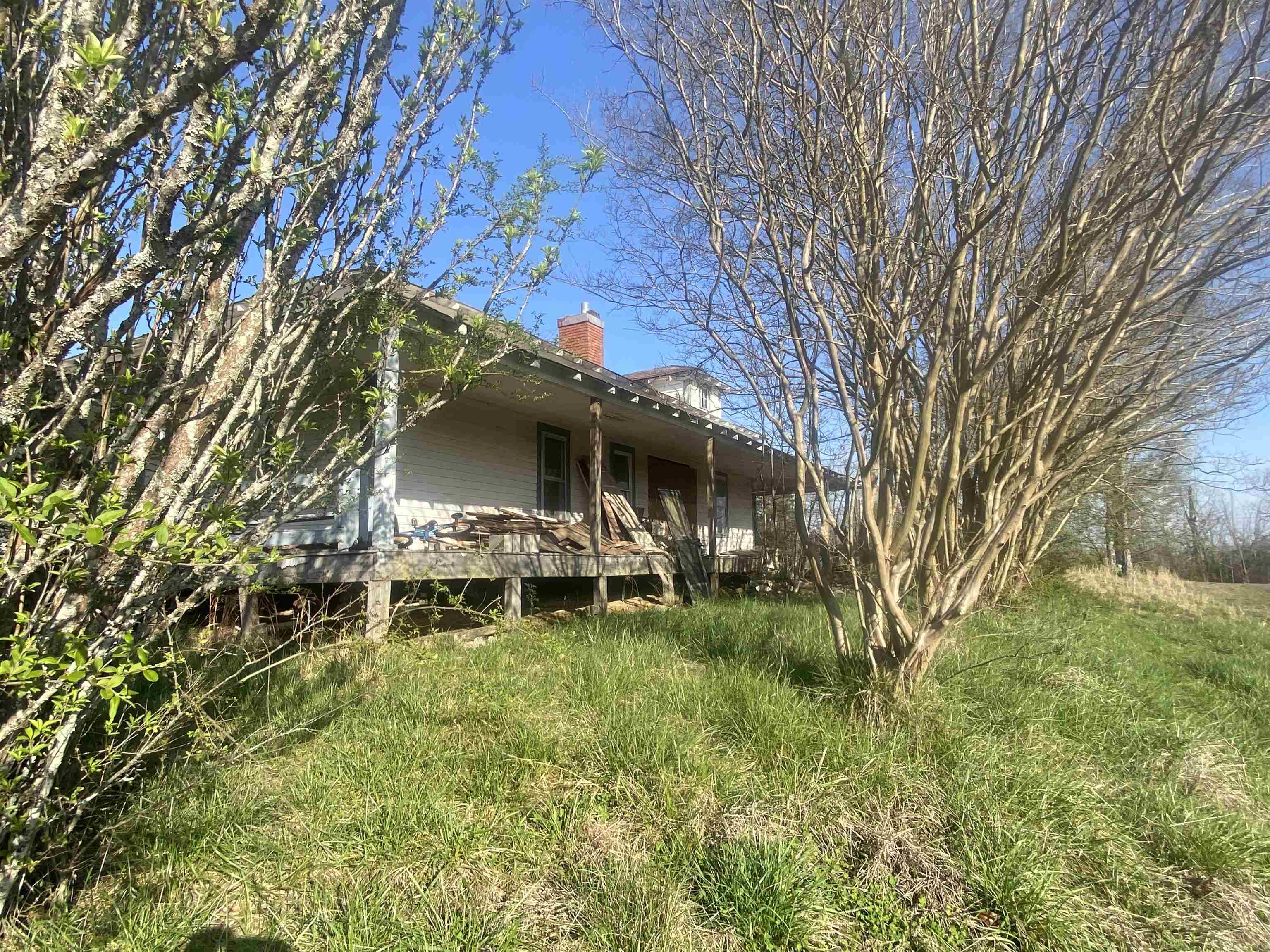 5405 Coffee Landing Road Morris Chapel, TN 38361 - Photo 24 of 32 a view of a house with a yard