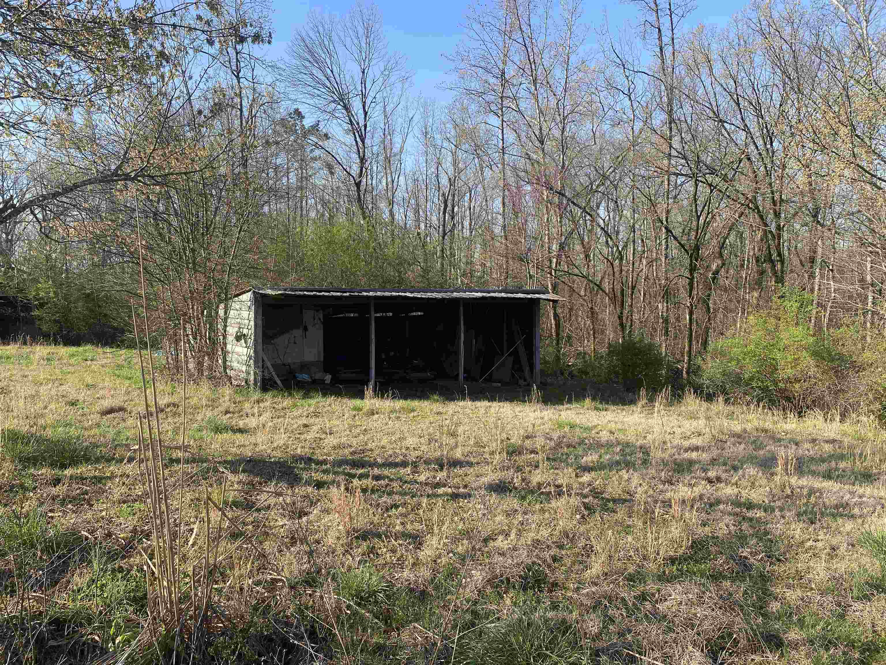 5405 Coffee Landing Road Morris Chapel, TN 38361 - Photo 29 of 32 a front view of a house with a yard