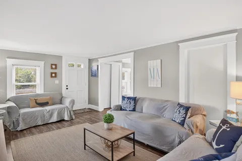 a living room with furniture and a couch