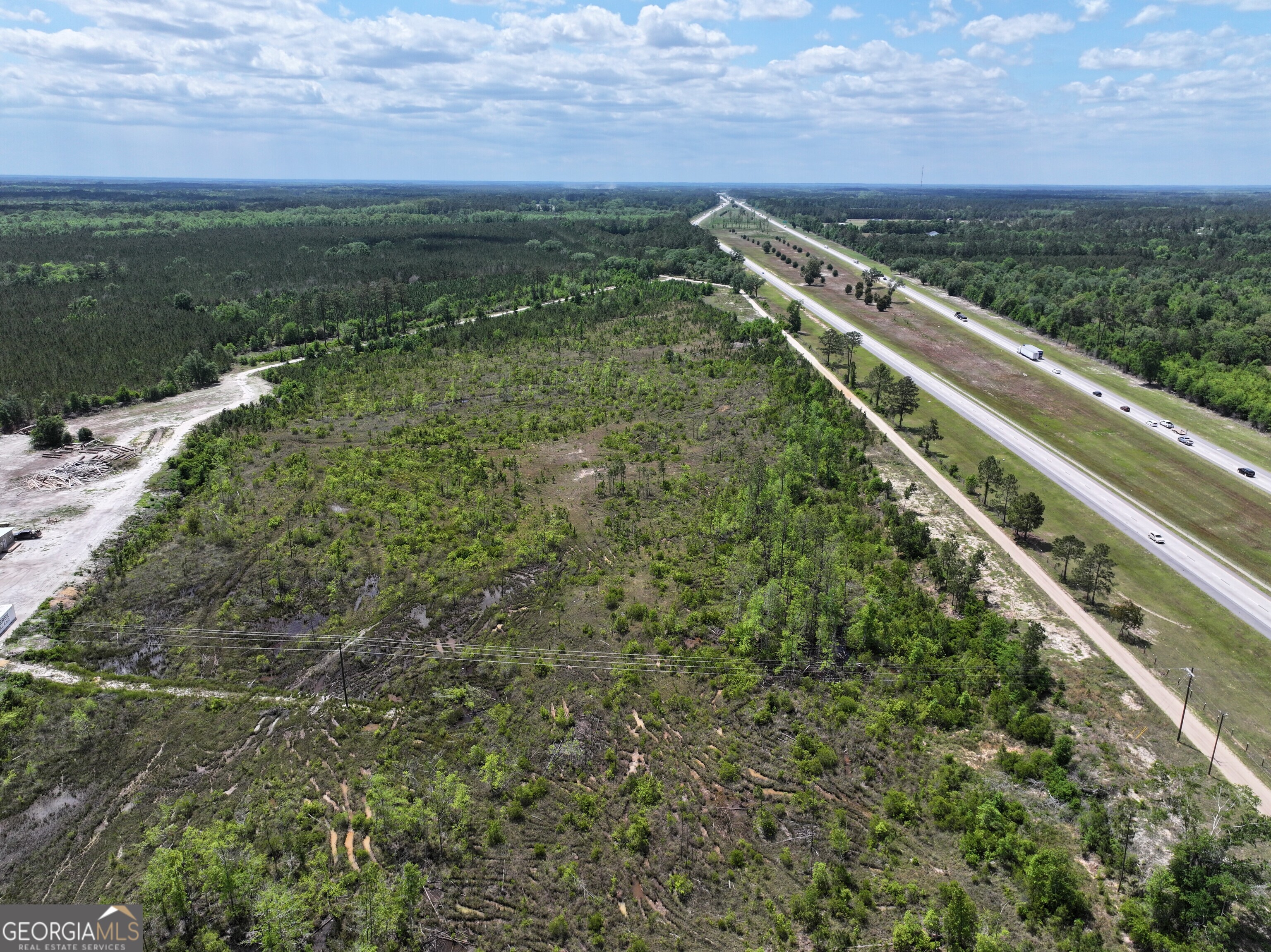 0 Newtown Road Pembroke, GA 31321 - Photo 4 of 6 a view of a field with an ocean