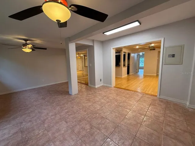 a view of an empty room and window