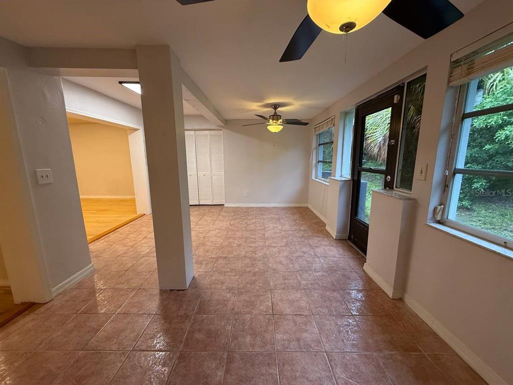 1217 McMullen Booth Road Clearwater, FL 33759 - Photo 14 of 44 a view of hallway with furniture and a large window