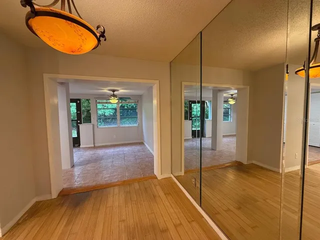 a view of a living room with a flat screen tv