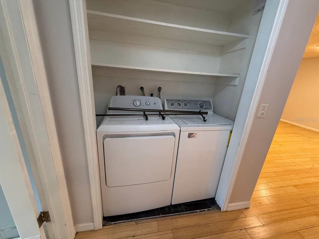 1217 McMullen Booth Road Clearwater, FL 33759 - Photo 25 of 44 a utility room with dryer and washer