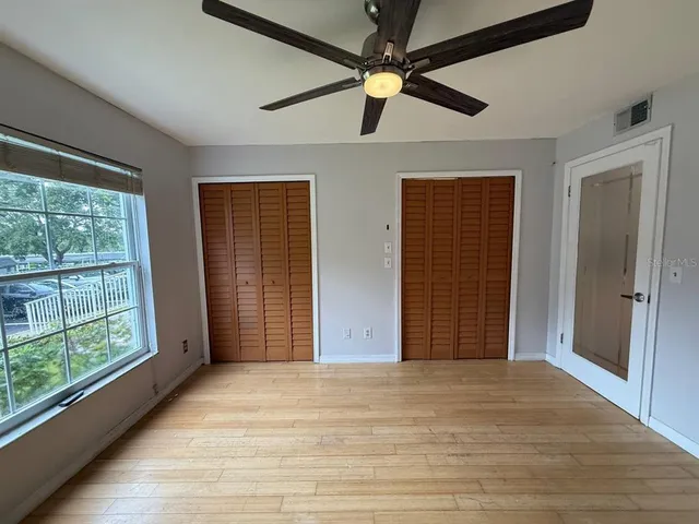 a view of a livingroom with a ceiling fan
