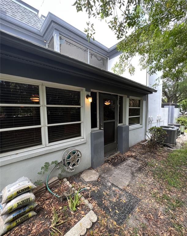 1217 McMullen Booth Road Clearwater, FL 33759 - Photo 37 of 44 a front view of a house with windows